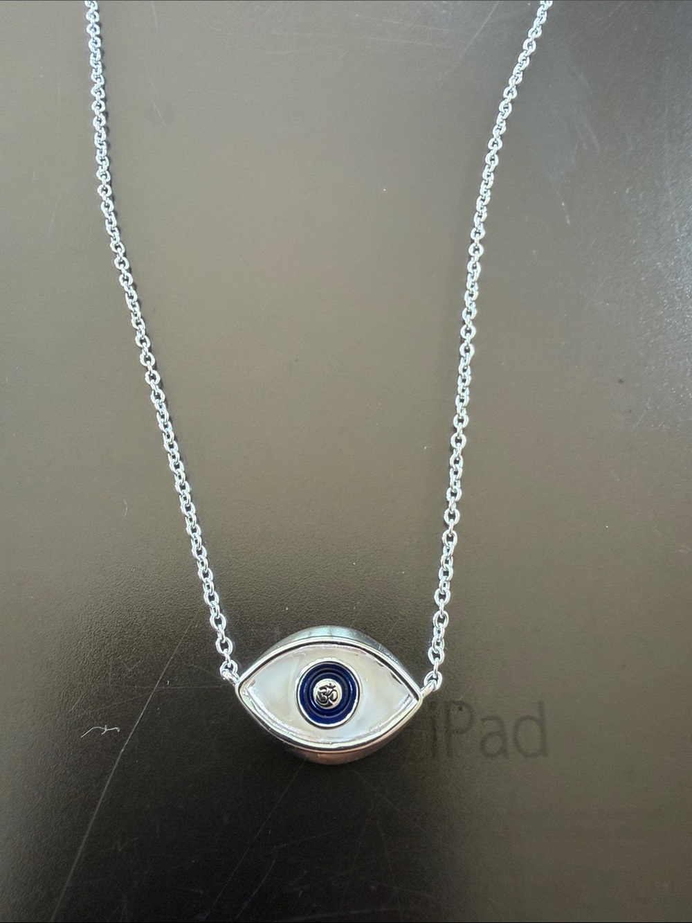 Sterling silver sand filled evil eye necklace
